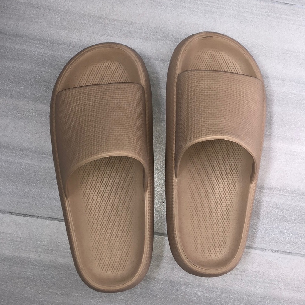 Tan rubber slides